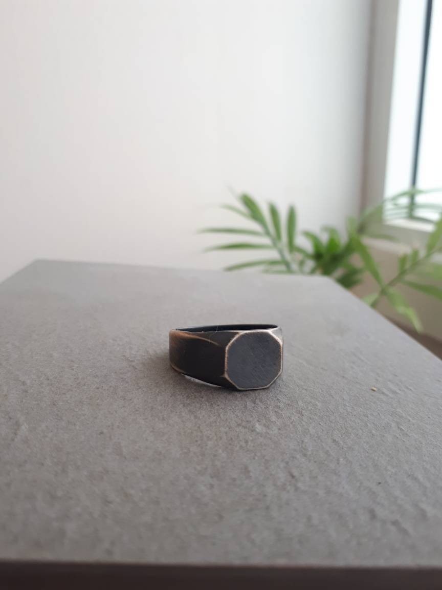 Big octagon signet ring for men and women.