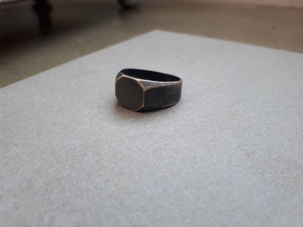 Big octagon signet ring for men and women.