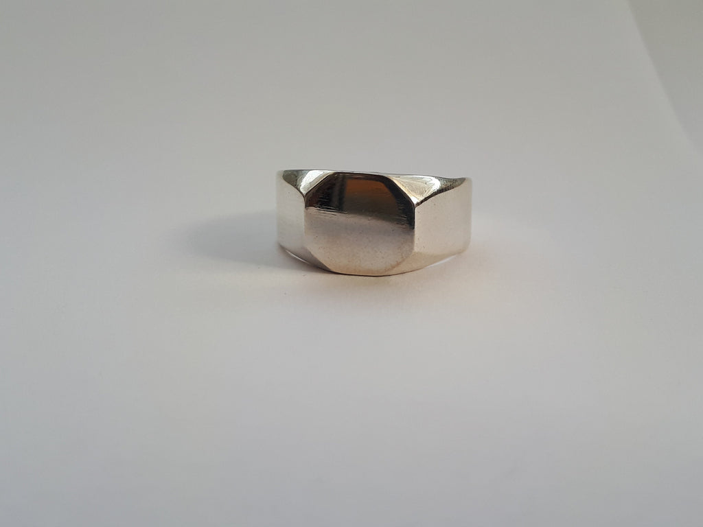 Big octagon signet ring for men and women.