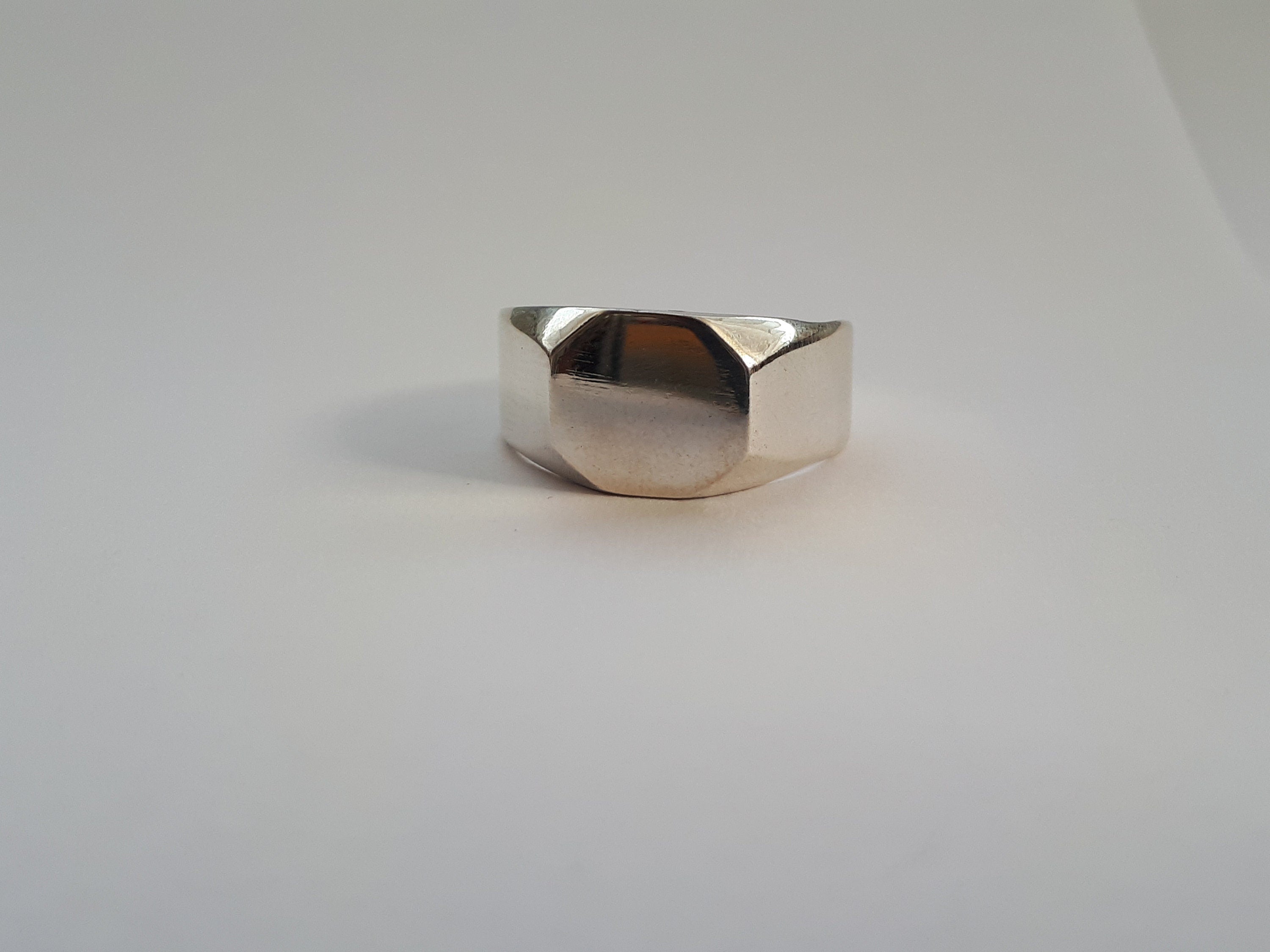 Big octagon signet ring for men and women.