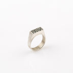 Silver rectangle signet ring with random Engraved lines