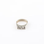 Silver rectangle signet ring with random Engraved lines