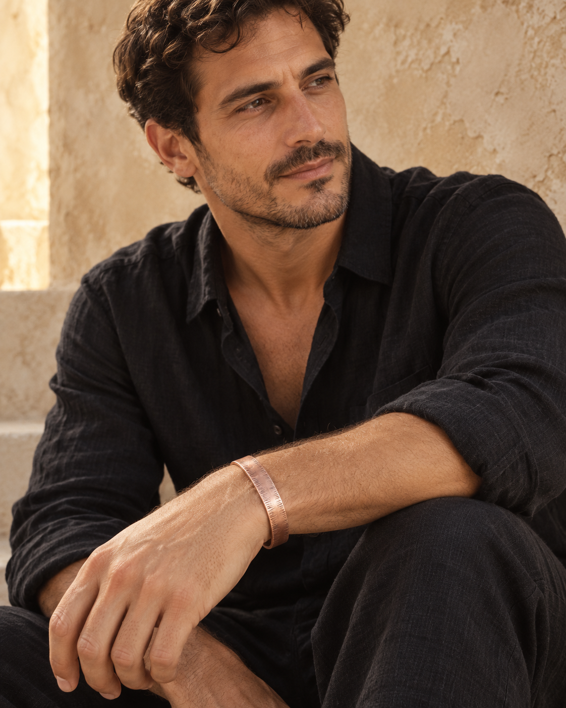 Male model wearing the textured copper cuff with a black linen shirt