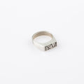 Silver rectangle signet ring with random Engraved lines