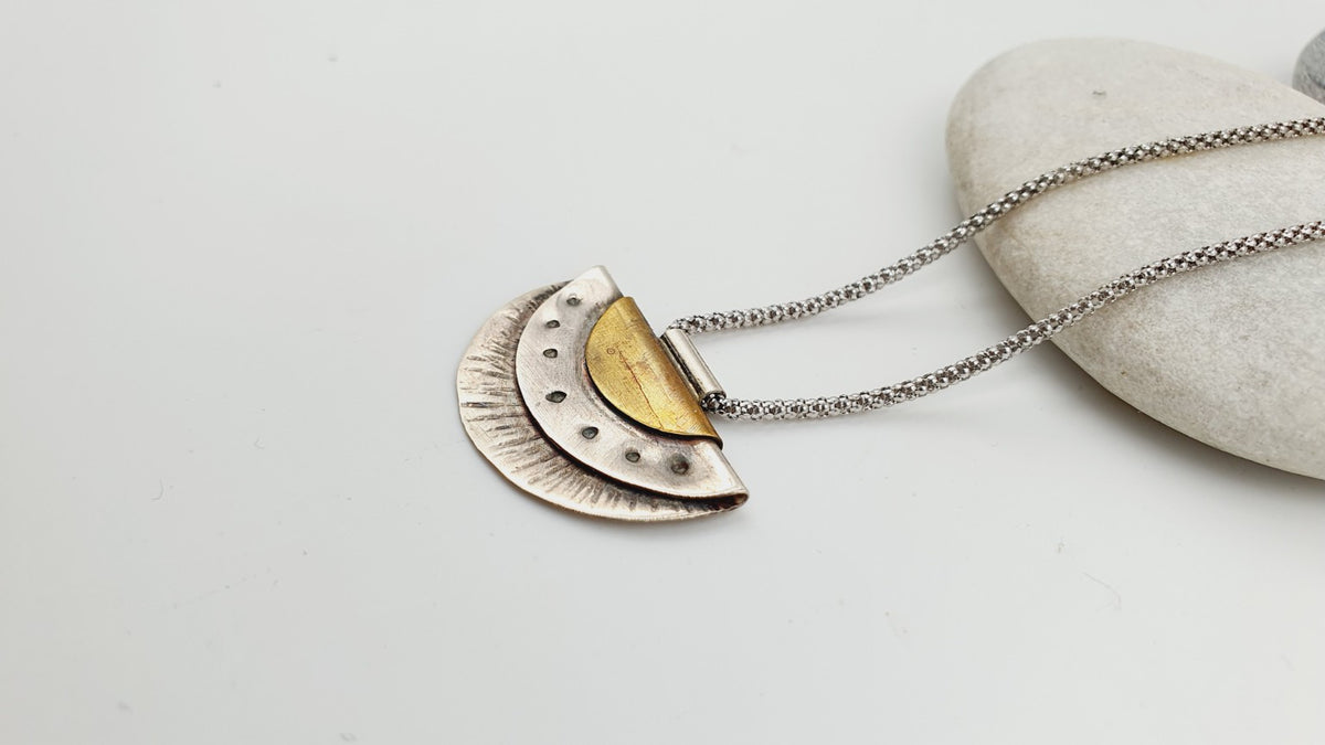 Layered fan necklace in sterling silver and brass – pendant detail