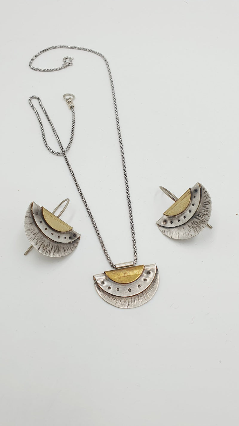 Fan necklace alongside matching earrings, sold separately